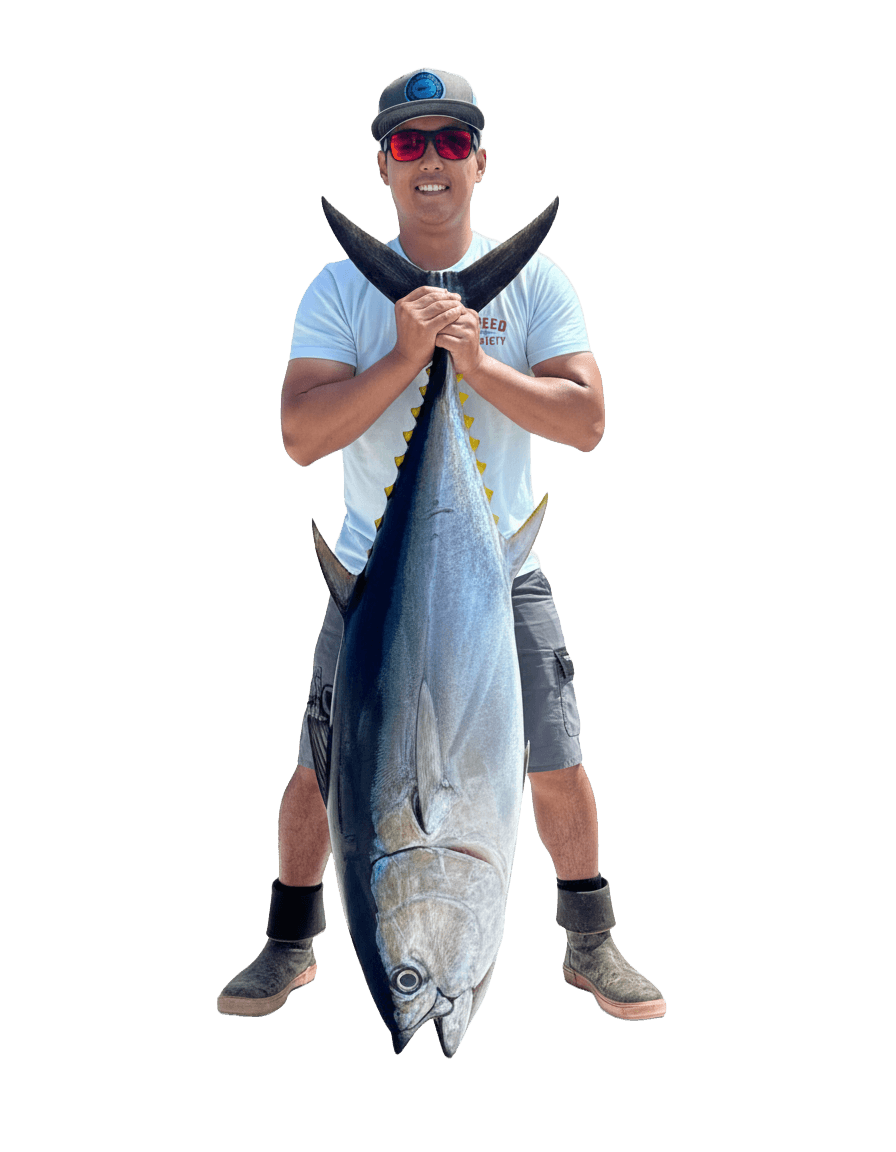 James Wie proudly holding a tuna